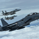 An F-15E Strike Eagle assigned to the 492nd Fighter Squadron flies in formation with a pair of single-seat F-15C Eagles of the 493rd Fighter Squadron over Gloucestershire, England in 2016 (US Air Force)